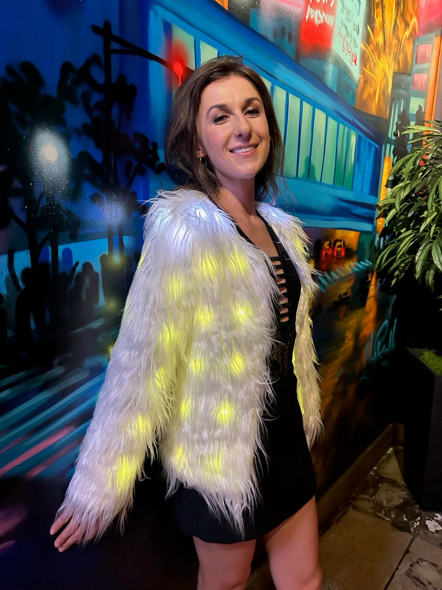 Women’s White Faux Fur Glow Jacket with ,featuring cutting-edge Smart LED Lights