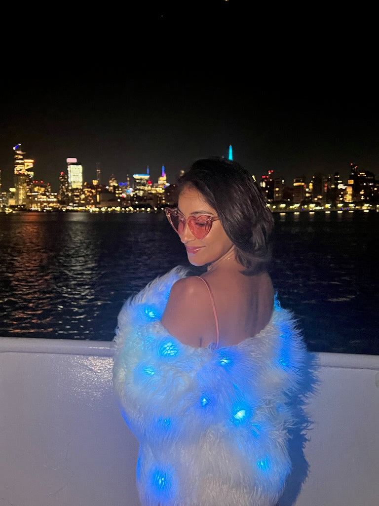 Women’s White Faux Fur Glow Jacket with ,featuring cutting-edge Smart LED Lights